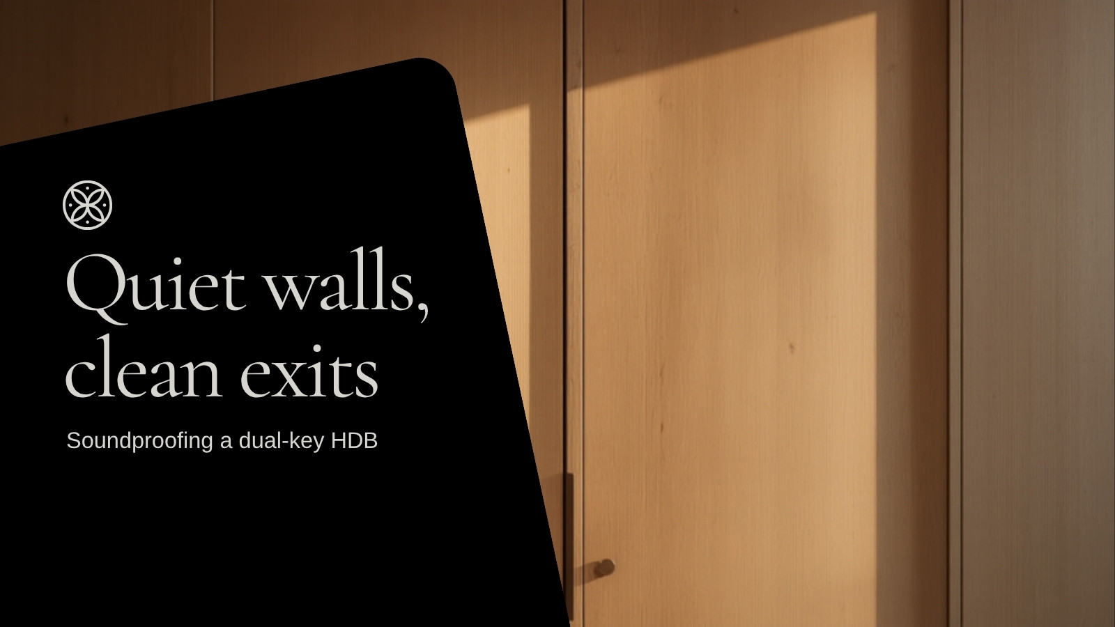 Full-height light oak joinery wall and solid timber door &mdash; dual-key HDB soundproofing
